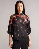 Eranthe High Neck Balloon Sleeve Blouse