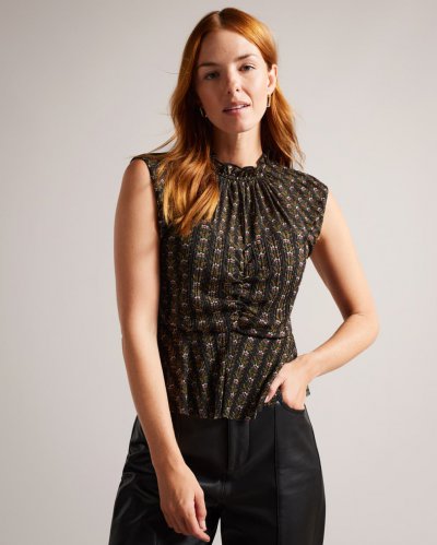 Khrisie Peplum Top With Frill Neck