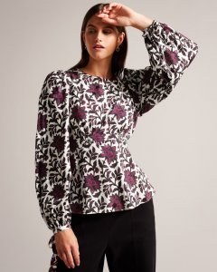 Terre Printed Peplum Top With Cuffed Sleeves